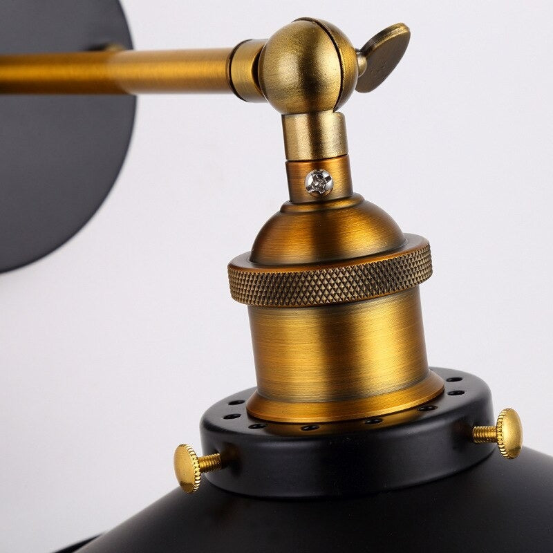 Focused on the unique lighting effect from the ORLUNE HOME wall light’s industrial shade.