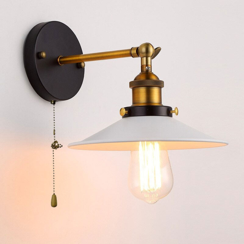 Vintage lighting shine: black base, brass arm, white shade, Edison bulb, pull-chain switch.