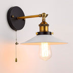 Vintage lighting shine: black base, brass arm, white shade, Edison bulb, pull-chain switch.