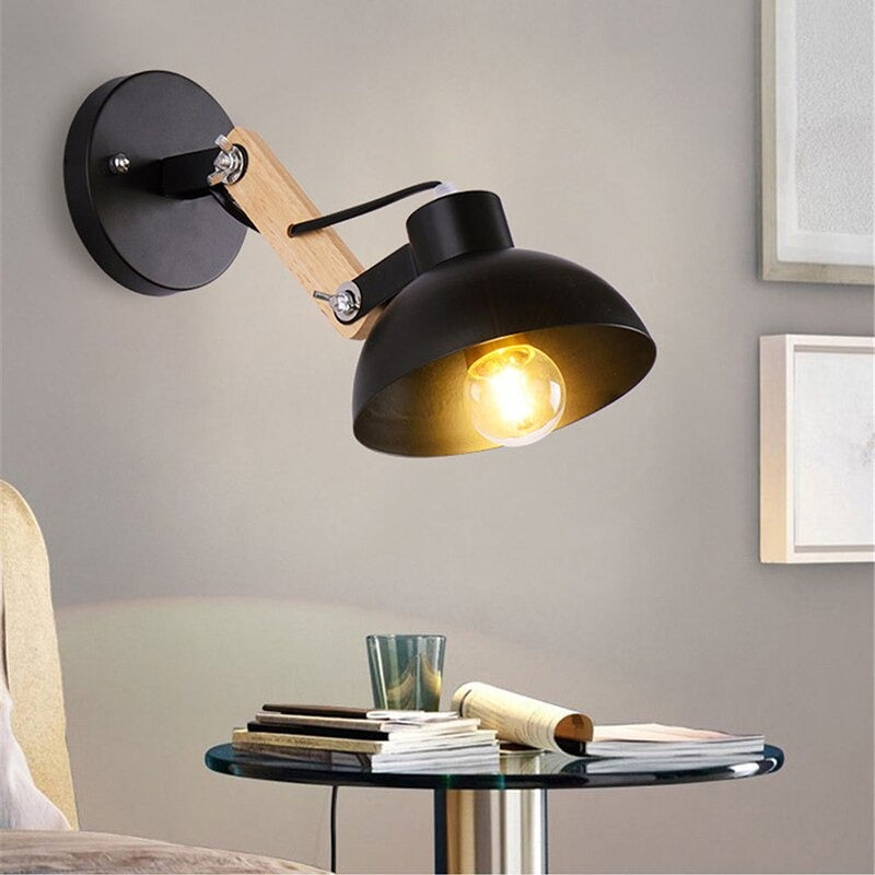 The ORLUNE HOME Retro Industrial Wall Light creates a warm, inviting glow above.