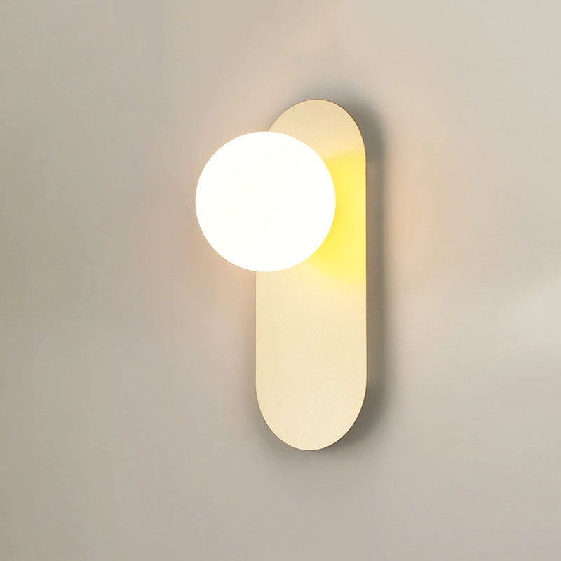 Add minimalist elegance to any room with this moon-shaped LED wall light’s soft glow.