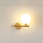 Warm LED glow radiates from a frosted glass globe on a crescent gold fixture.