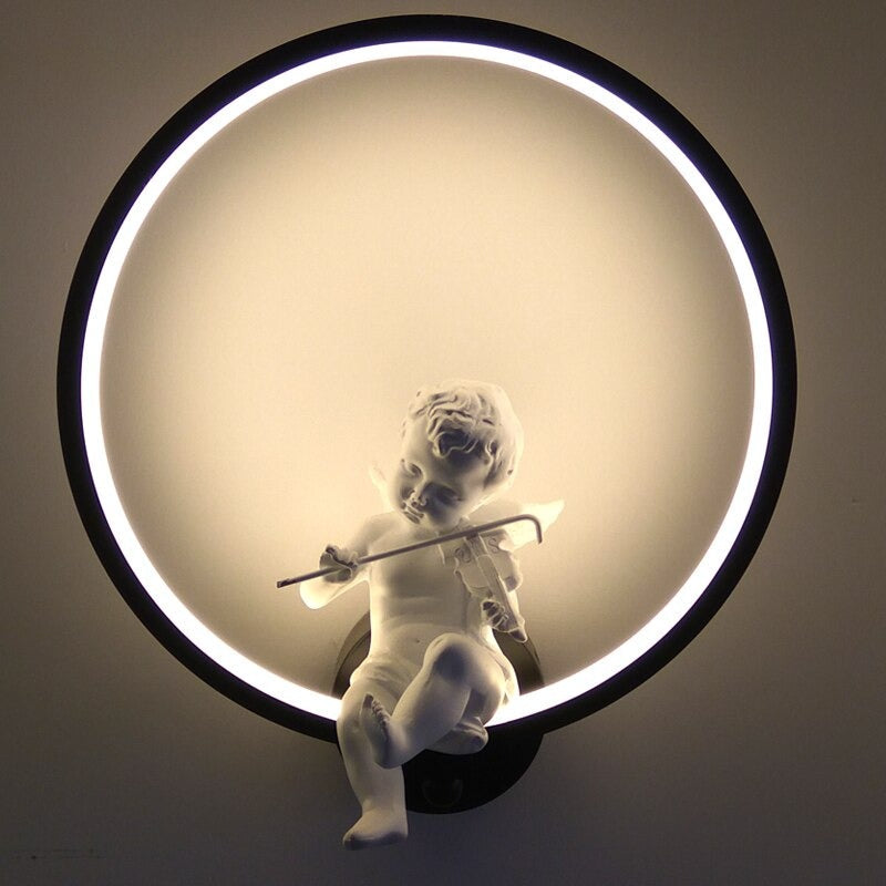Emits enchanting, elegant accent lighting with its circular LED ring and cherub design.
