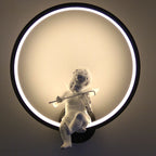 Emits enchanting, elegant accent lighting with its circular LED ring and cherub design.