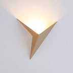 Warm LED upward lighting creates a soft, inviting glow with a modern geometric touch.