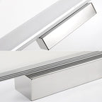 Sleek LED wall light emits modern illumination—perfect for accenting your bathroom mirror.
