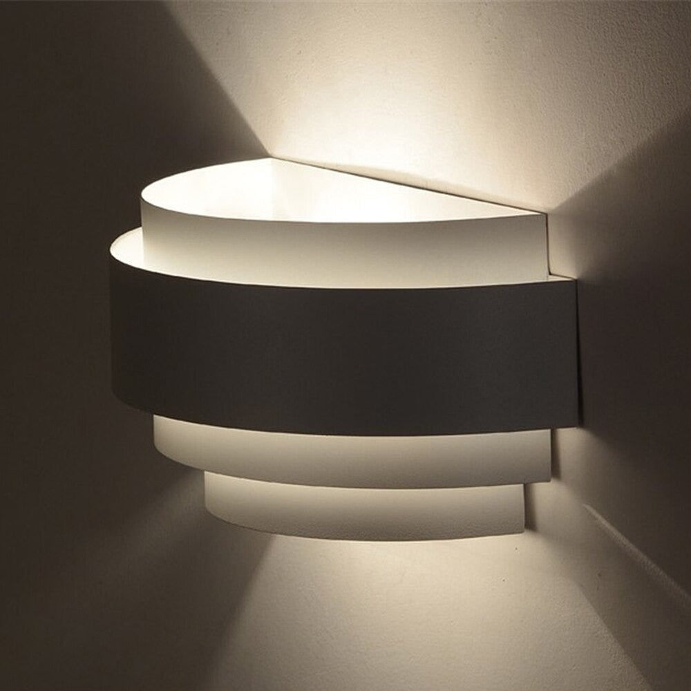 Soft, diffused LEDs cast gentle up and down lighting for a warm, ambient glow.