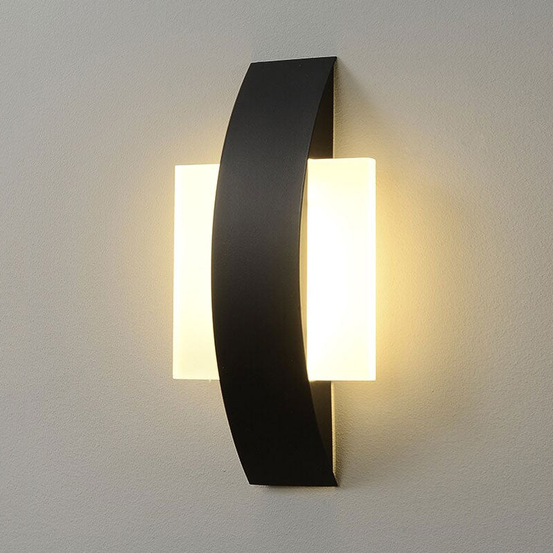 Modern ring wall light emits a warm, stylish glow—perfect for chic accent lighting.
