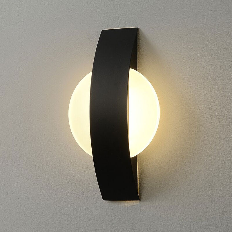 Glowing circular wall light radiates modern elegance, creating stunning illumination with sleek design.