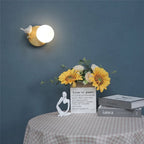 The ORLUNE HOME Bird Design LED Wall Light offers soft, elegant illumination above.