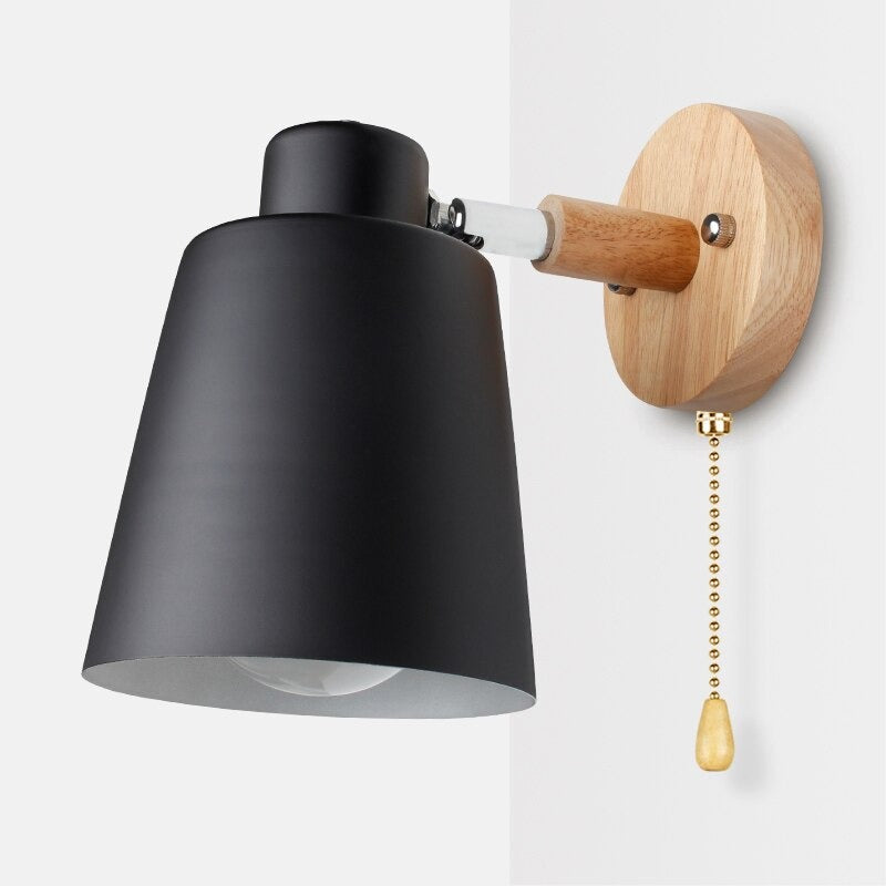 Illuminate your space with adjustable, focused lighting from this sleek, modern wall fixture.