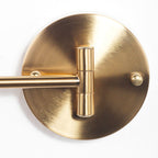 Retro golden wall light with a swivel arm, perfect for adding elegant illumination.