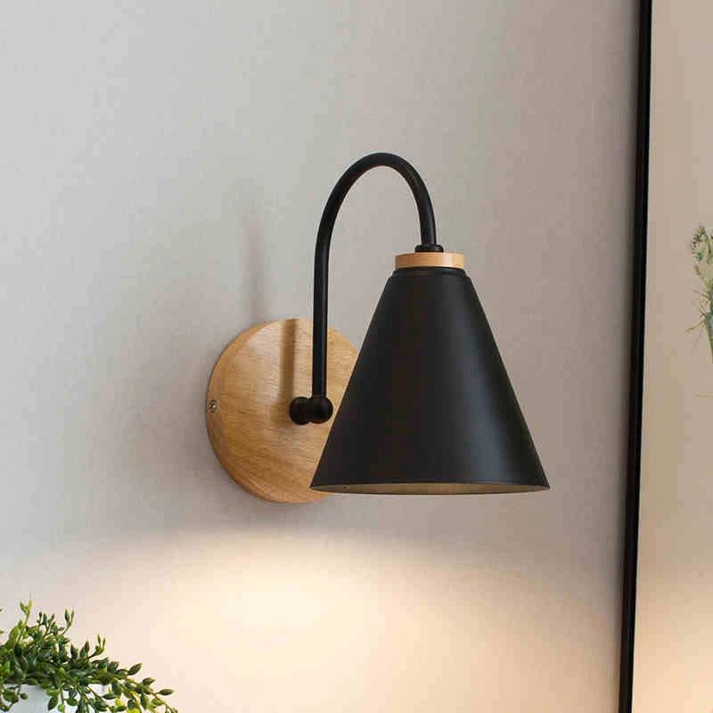 The ORLUNE HOME wall lamp delivers focused, stylish illumination with its conical shade design.