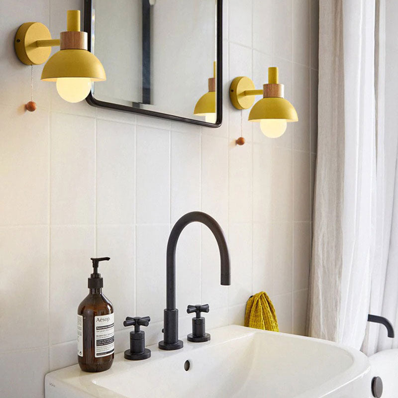 Warm ORLUNE HOME Scandinavian Wooden Wall Lights perfectly frame and illuminate the mirror.