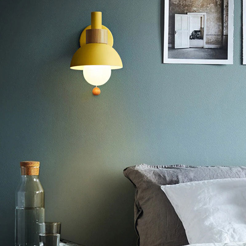 The ORLUNE HOME wall light casts a cozy, Scandinavian-inspired glow over the space.