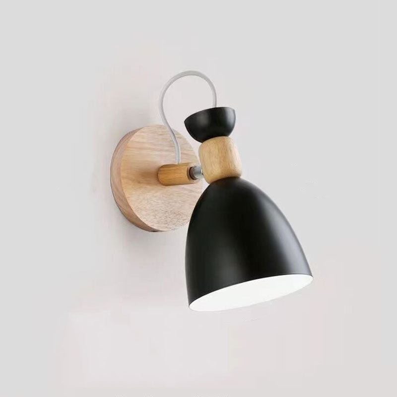 Soft adjustable lighting, modern Scandinavian lamp with black shade and wooden base.