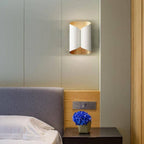 The ORLUNE HOME Black Metal Industrial Wall Light with Curved Tubes adds sleek, moody illumination.