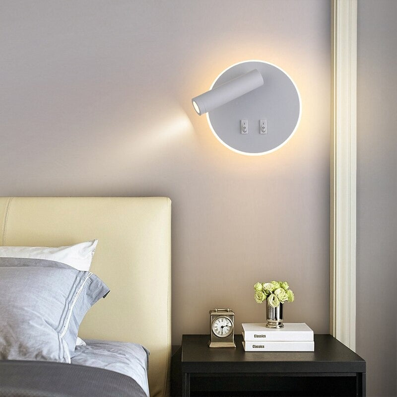 Experience the ORLUNE HOME Round LED Wall Light’s adjustable, soothing illumination for nighttime reading.
