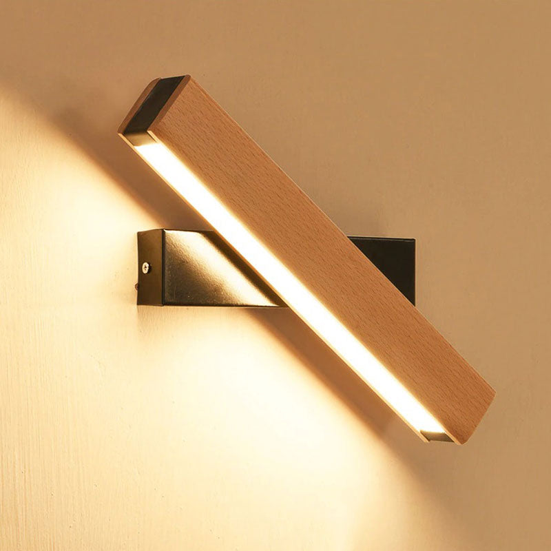 Experience a warm white glow with this adjustable LED wall light’s sleek, modern shine.