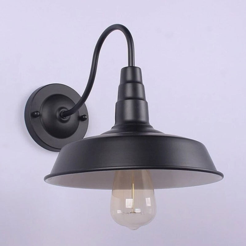 Brighten your space with this industrial wall light—vintage charm and focused illumination.