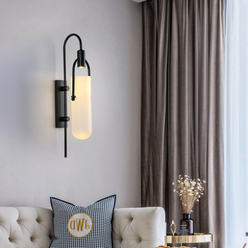 The ORLUNE HOME Estane LED sconce with frosted glass shade emits a soft, cozy glow.
