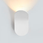 Soft, warm LED glow from a sleek white oval light—accent lighting redefined.