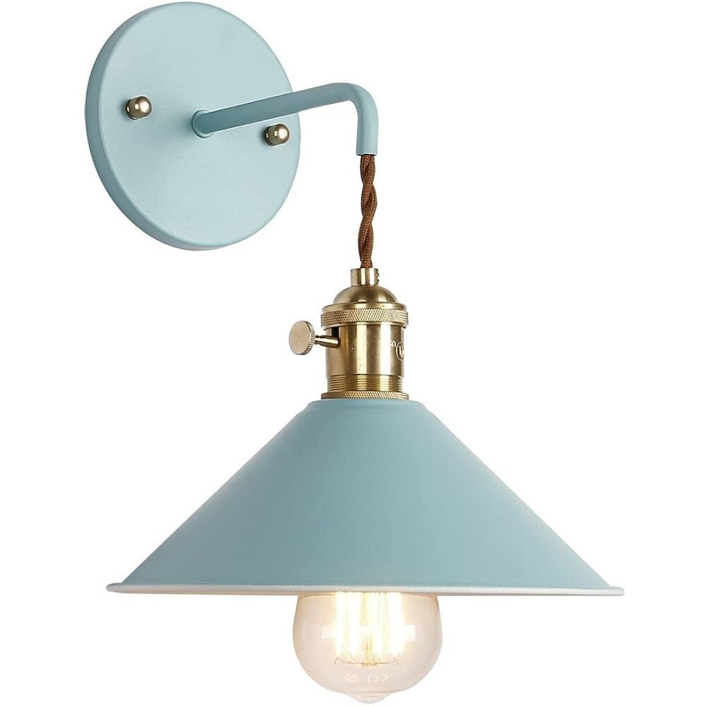 Illuminate your kitchen with vintage charm: blue shade and brass hardware brighten any wall.