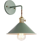 ORLUNE HOME’s vintage wall light blends sage green, brass, and exposed bulb elegance.