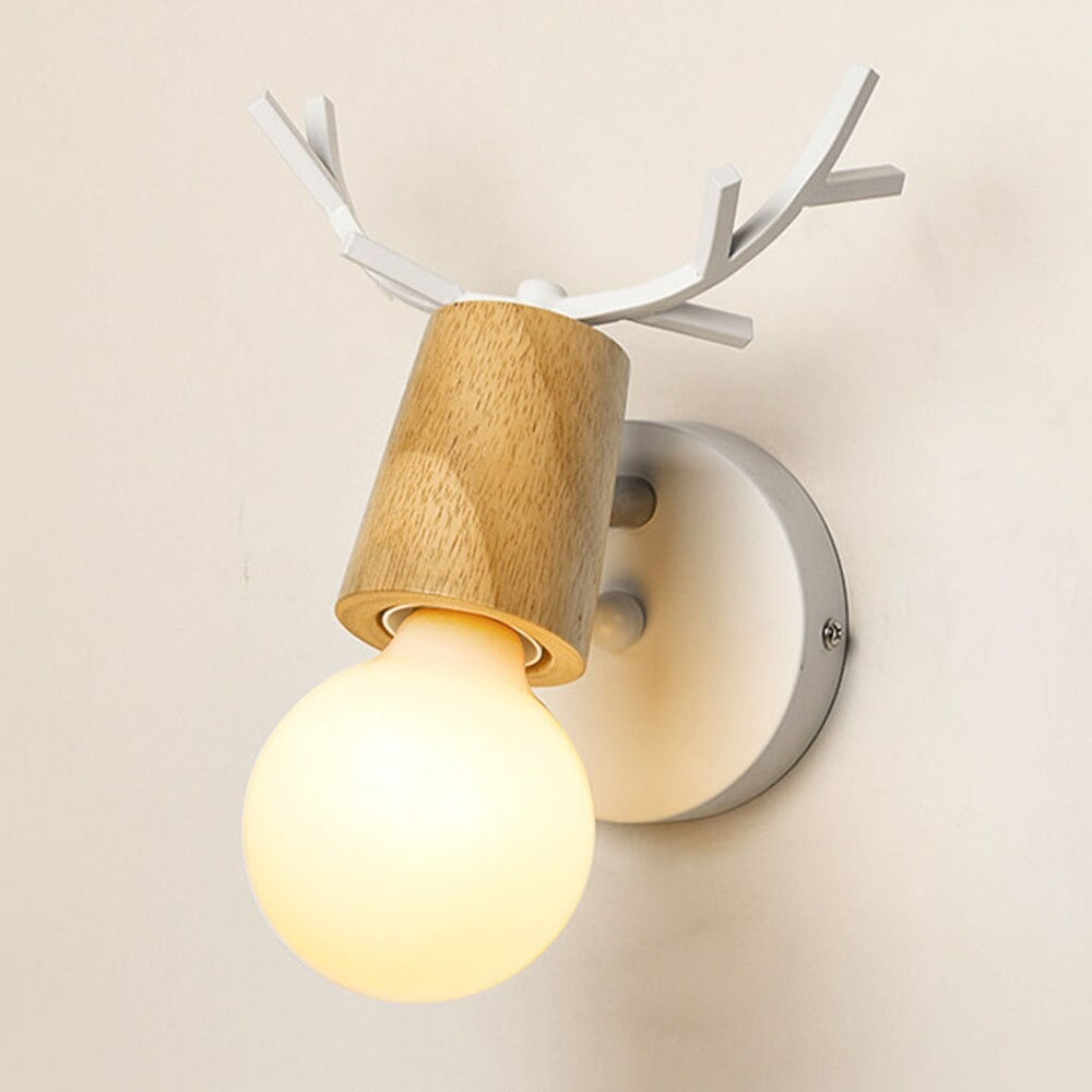 Sleek round bulb and wooden socket create warm, stylish illumination with playful antler detail.