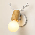 Sleek round bulb and wooden socket create warm, stylish illumination with playful antler detail.