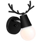 Chic antler branches, black sconce, and white bulb create playful, eye-catching kitchen lighting.