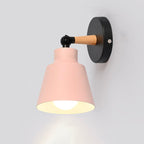 Soft pink light glows from a sleek matte lampshade, creating a cozy ambiance.