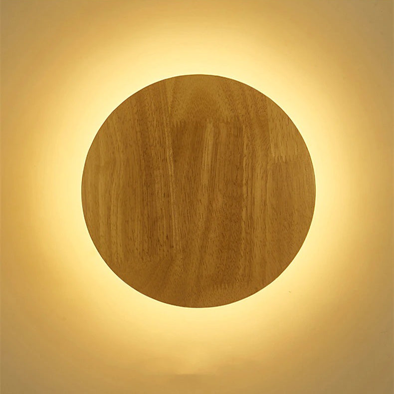 Soft yellow light forms a glowing halo, gently brightening your space from the wall.