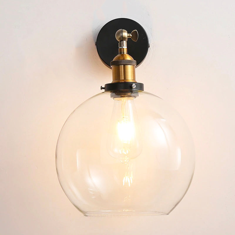 Brighten your space with a clear globe shade and glowing exposed filament bulb.