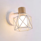 Experience elegant illumination with this glowing bulb encased in a geometric white cage sconce.