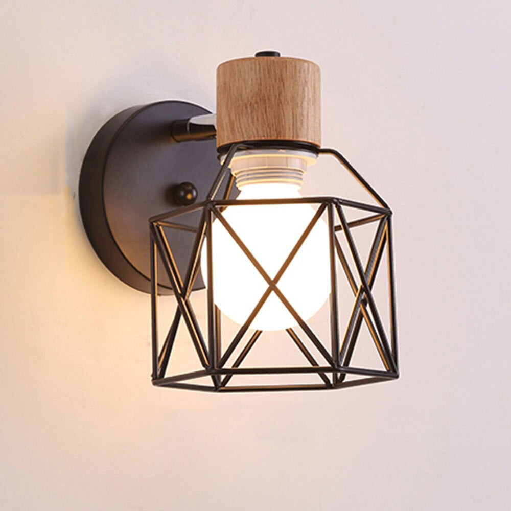 This sconce’s geometric metal cage and wood accent cast warm, modern lighting indoors.