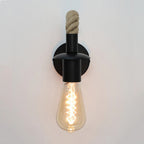 Warm Edison bulb and rope detail create cozy, industrial-inspired lighting for your space.