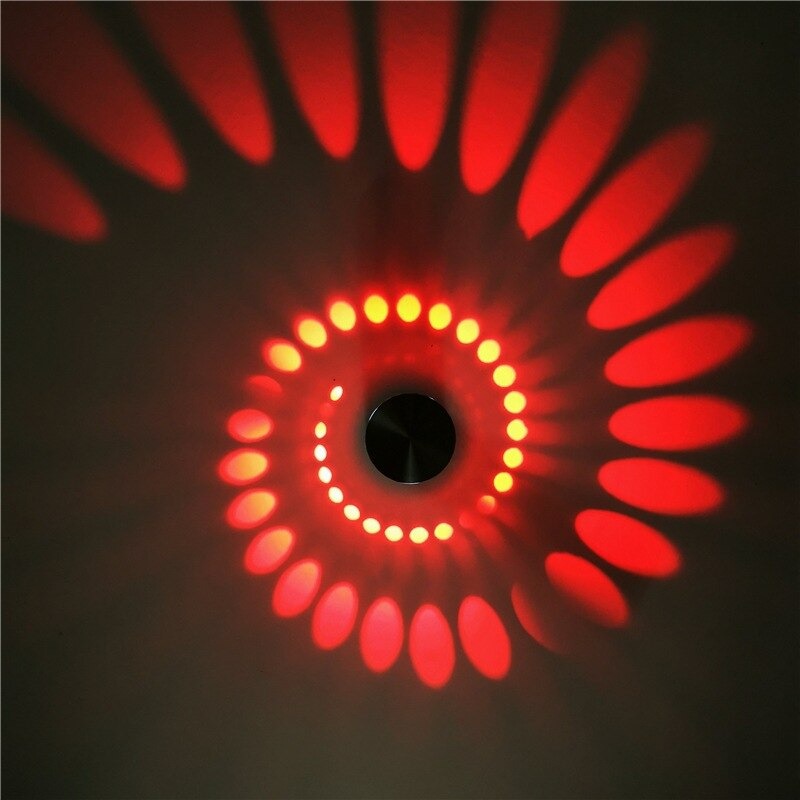 Red ovals and dots glow vividly, creating abstract, eye-catching lighting on your walls.