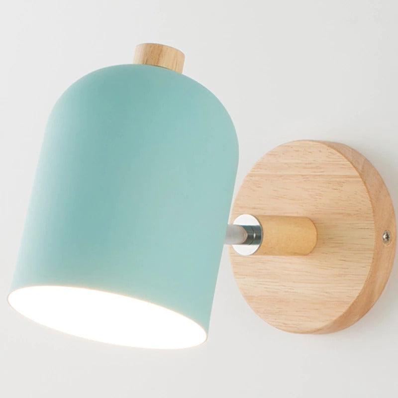 Modern wall light with pale blue shade and wood accents for bright, stylish illumination.