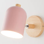 Soft white glow gently radiates from a matte pink shade for warm, modern illumination.