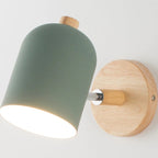 Soft glow radiates from matte green shade, enhancing any modern kitchen with gentle lighting.