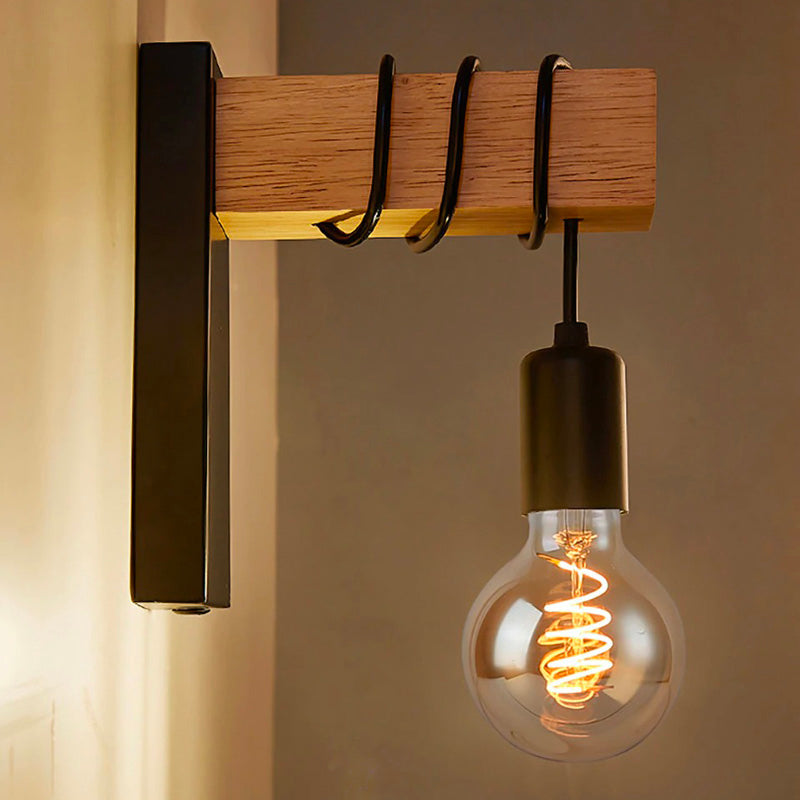 Modern sconce with exposed glowing bulb delivers eye-catching, stylish lighting to your space.