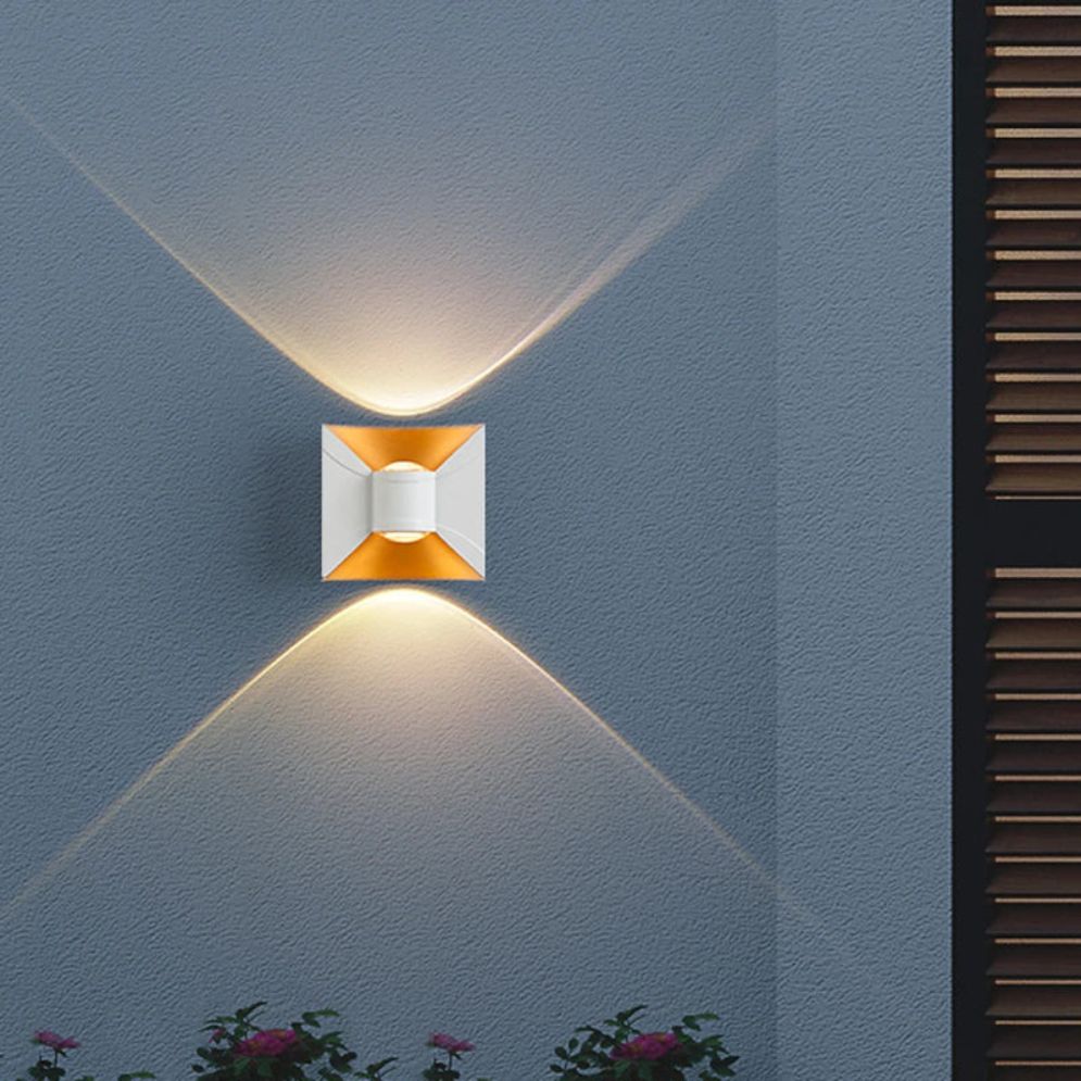 The sconce’s geometric design casts elegant, soft up and down LED illumination.