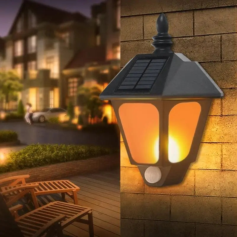 Luminaire mural LED rectangle en aluminium diffusant une lumière chaude sur un mur en briques.