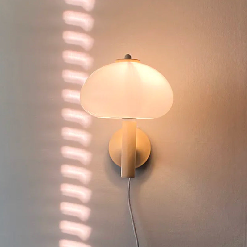 Soft, glowing mushroom wall light creates ambient illumination with stunning sunlight patterns.