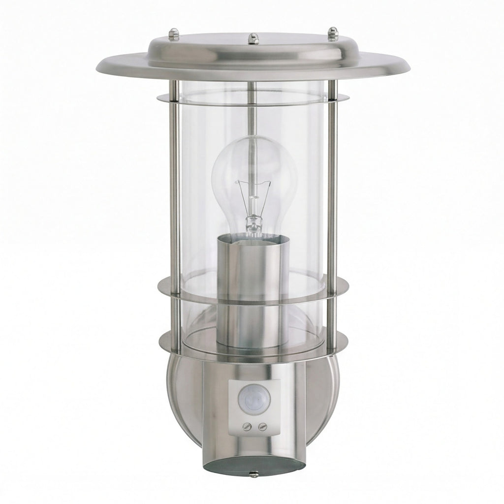 Stainless steel outdoor wall light with clear glass, visible bulb, and motion sensor at base.