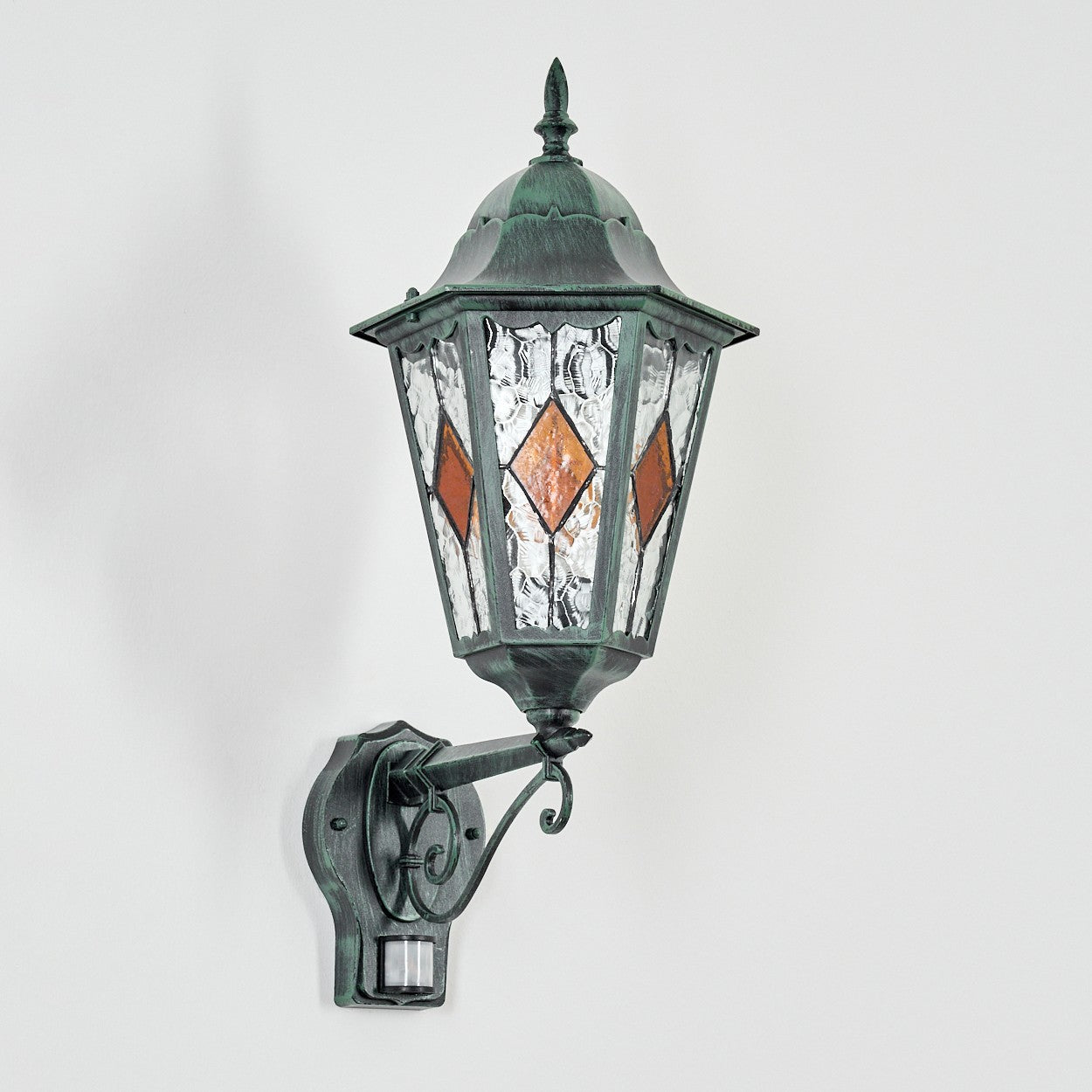 ORLUNE HOME light delivers bright, sensor-activated outdoor illumination with textured glass.